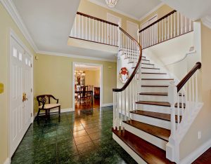 Dramatic foyer with staircase